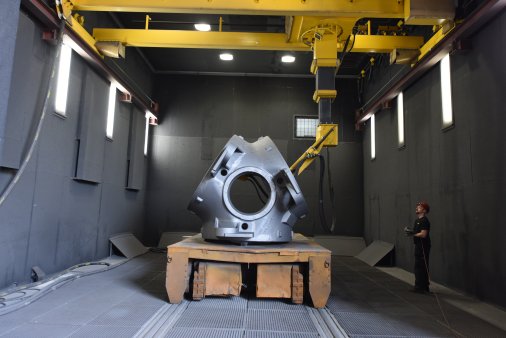 Blast cleaning large castings at Germany with Blastman gantry-type robot